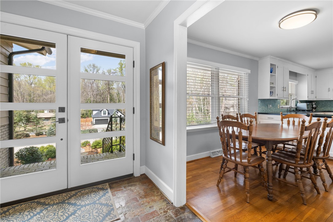 210 Riggs Drive Clemson, SC 29631 - Photo 4 of 36 This inviting home offers an open-concept layout with gleaming hardwood floors and ample natural light.