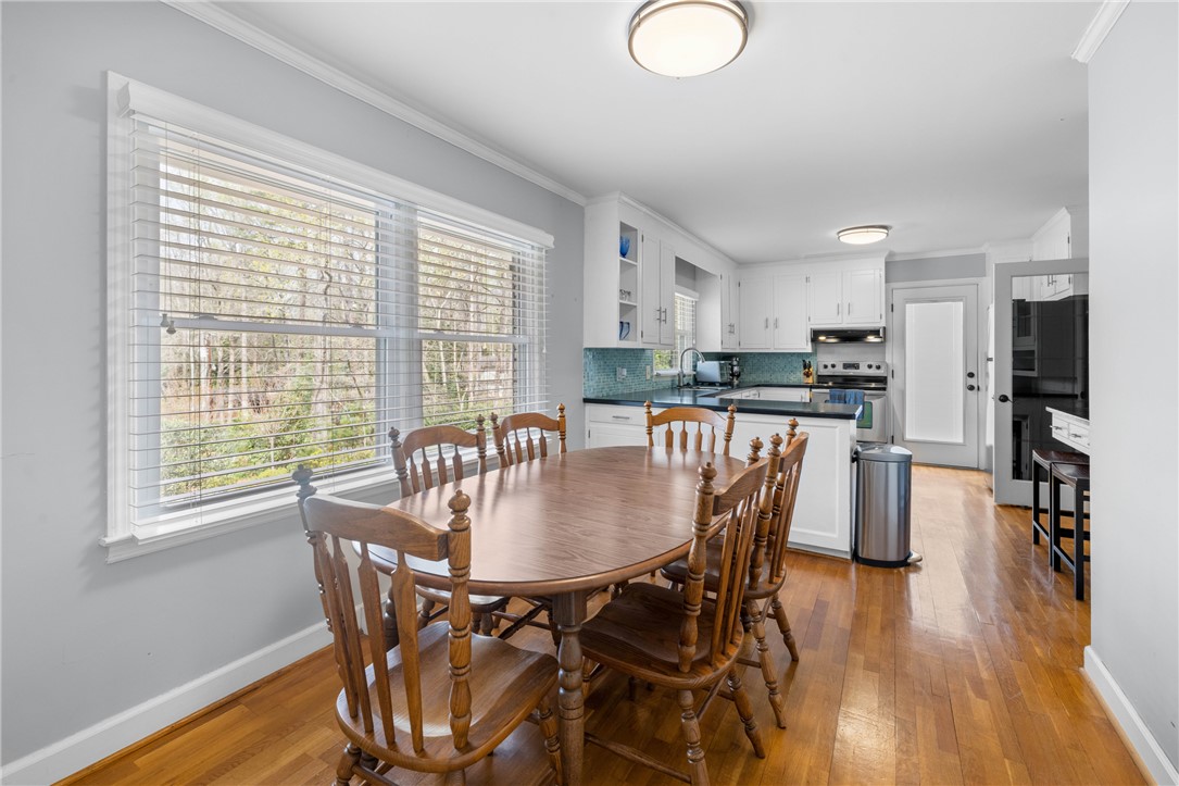 210 Riggs Drive Clemson, SC 29631 - Photo 5 of 36 This bright eat-in kitchen features ample natural light and a beautiful backsplash.