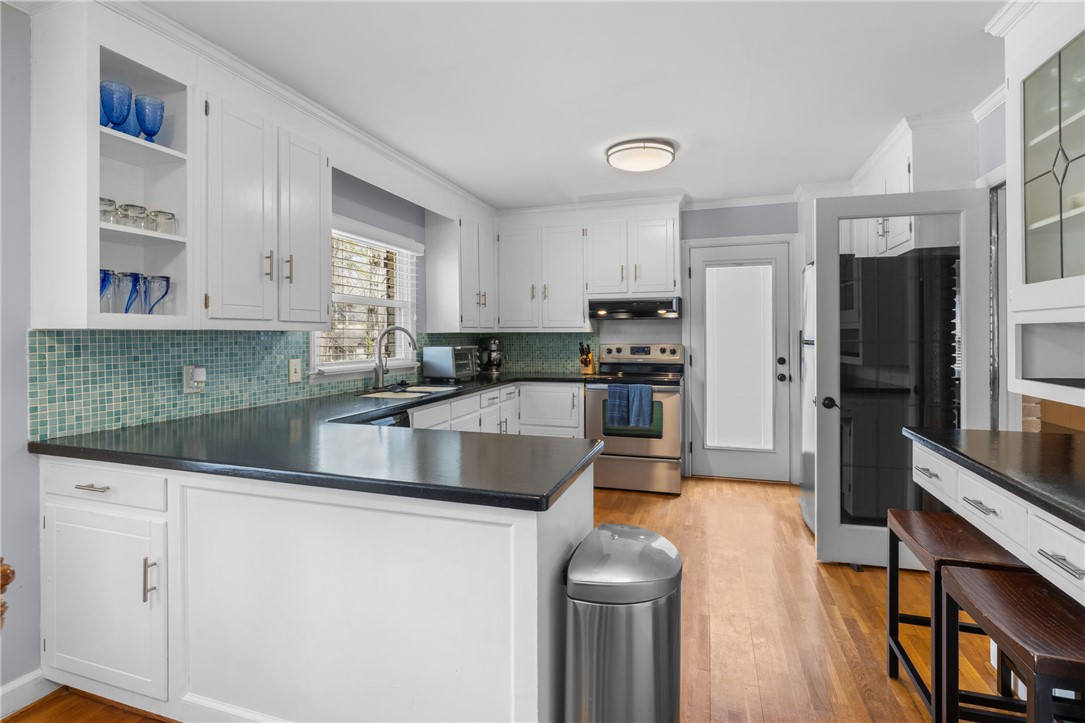 210 Riggs Drive Clemson, SC 29631 - Photo 6 of 36 This bright kitchen features ample counter space and modern appliances, perfect for everyday living.