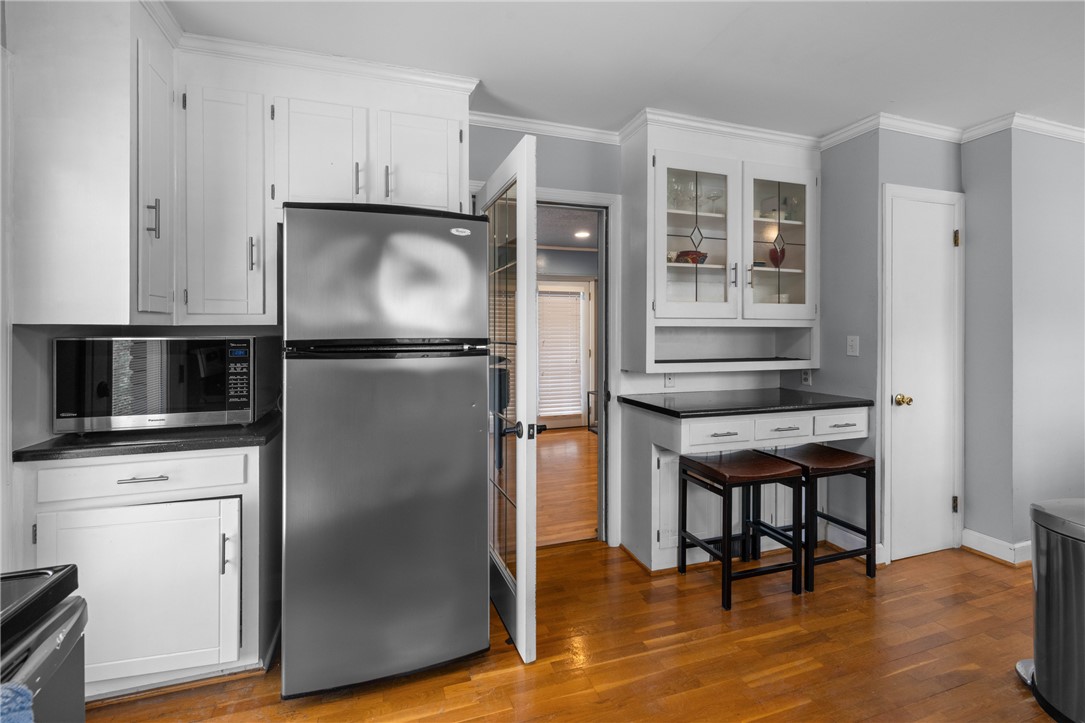 210 Riggs Drive Clemson, SC 29631 - Photo 8 of 36 This functional kitchen features gleaming hardwood floors and ample cabinet space for all your culinary needs.
