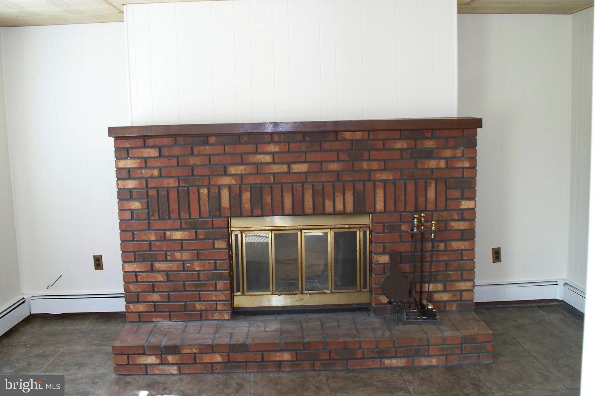 34 Micahill Road Levittown, PA 19056 - Photo 12 of 24 Wood Burning Fireplace