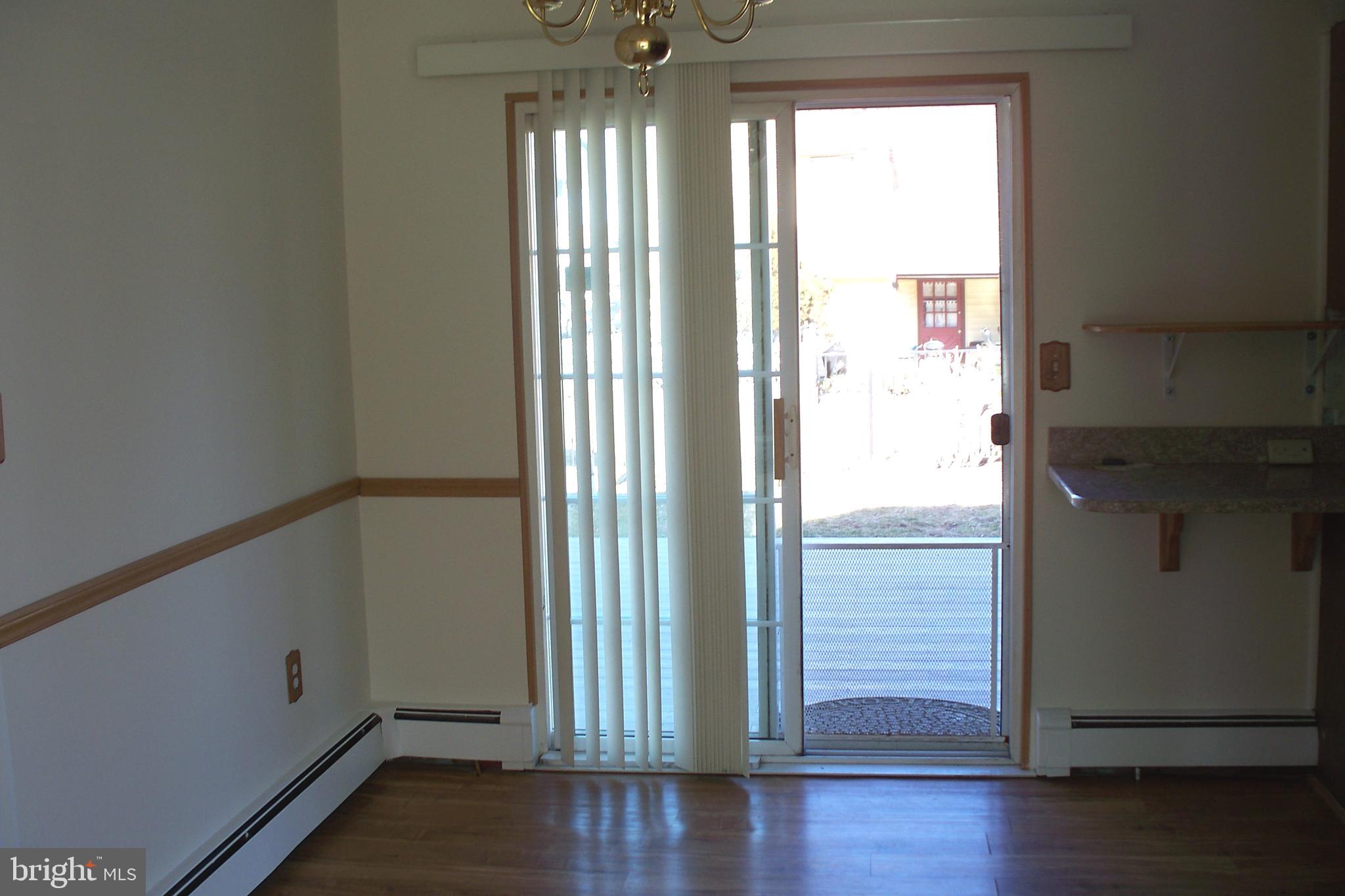 34 Micahill Road Levittown, PA 19056 - Photo 13 of 24 Eat-In Kitchen with slider to deck