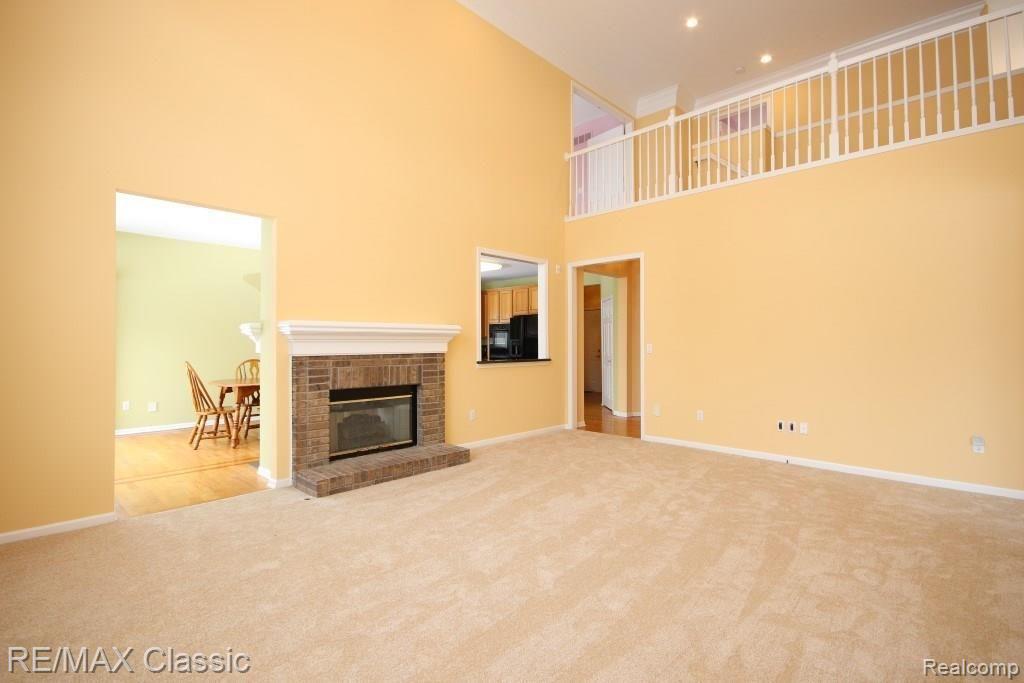 47790 Pavillon Road Canton, MI 48188 - Photo 24 of 45 Family room with pass-thru to the kitchen.