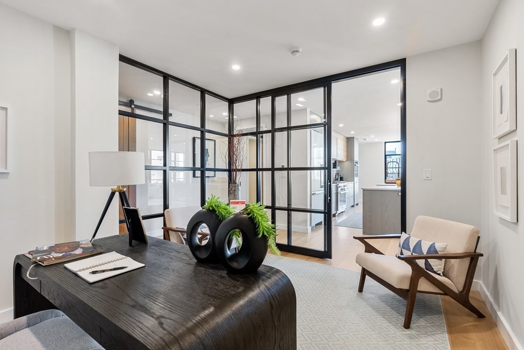 76 Wareham Street, Unit 4A Boston, MA 02118 - Photo 17 of 38 a living room with furniture and a window