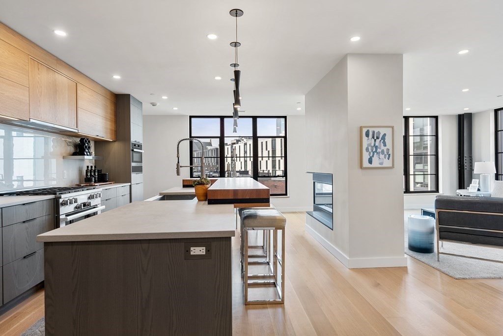 76 Wareham Street, Unit 4A Boston, MA 02118 - Photo 23 of 38 a kitchen with a sink appliances and a counter top space