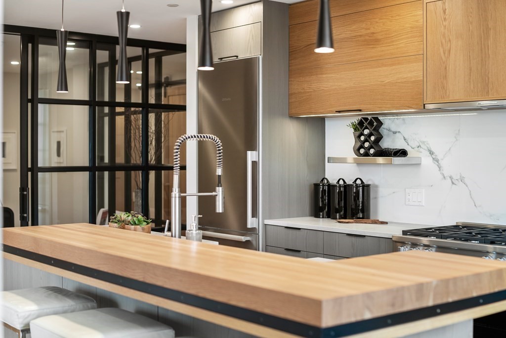 76 Wareham Street, Unit 4A Boston, MA 02118 - Photo 29 of 38 a bedroom with a bed and dresser