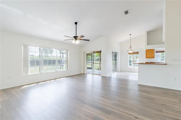 a view of a kitchen and dining room