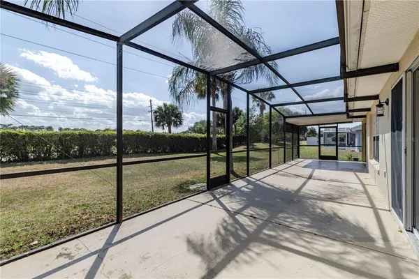 a view of an empty room with a sliding door
