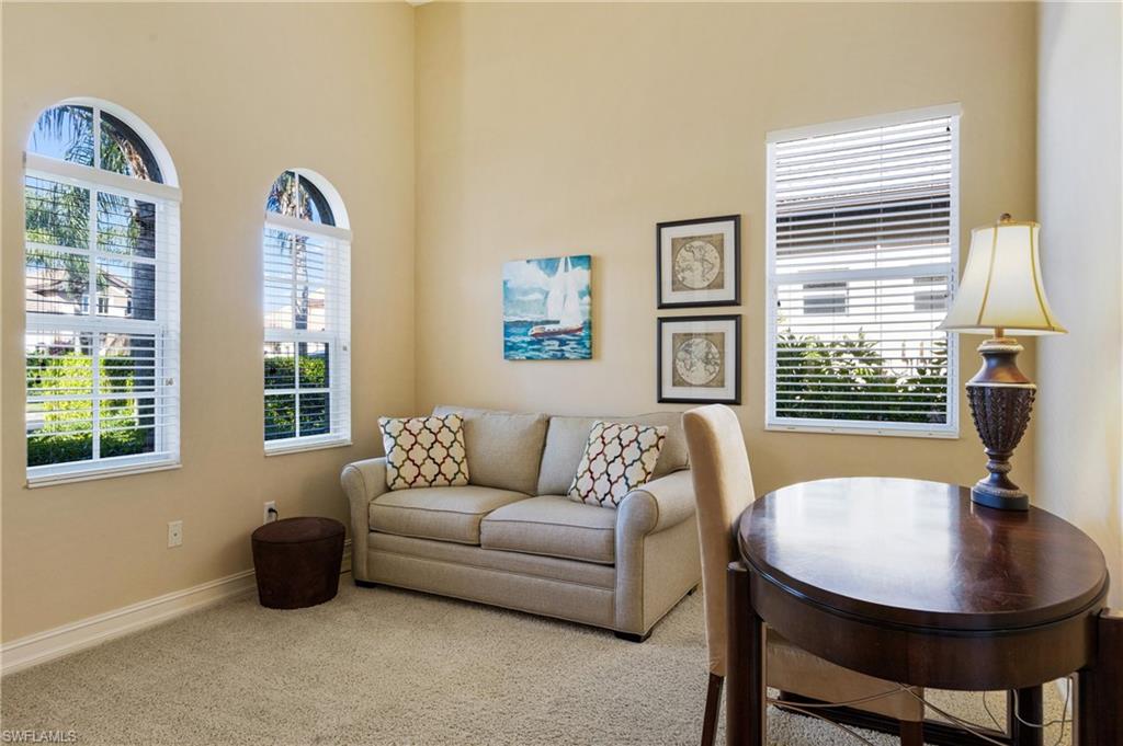 7794 Ashton Road Naples, FL 34113 - Photo 4 of 34 a living room with furniture and a window