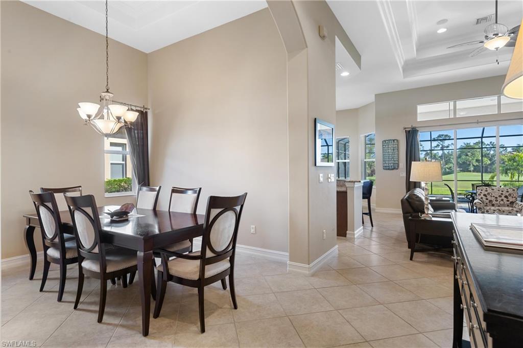 7794 Ashton Road Naples, FL 34113 - Photo 9 of 34 a view of a dining room with furniture window and outside view