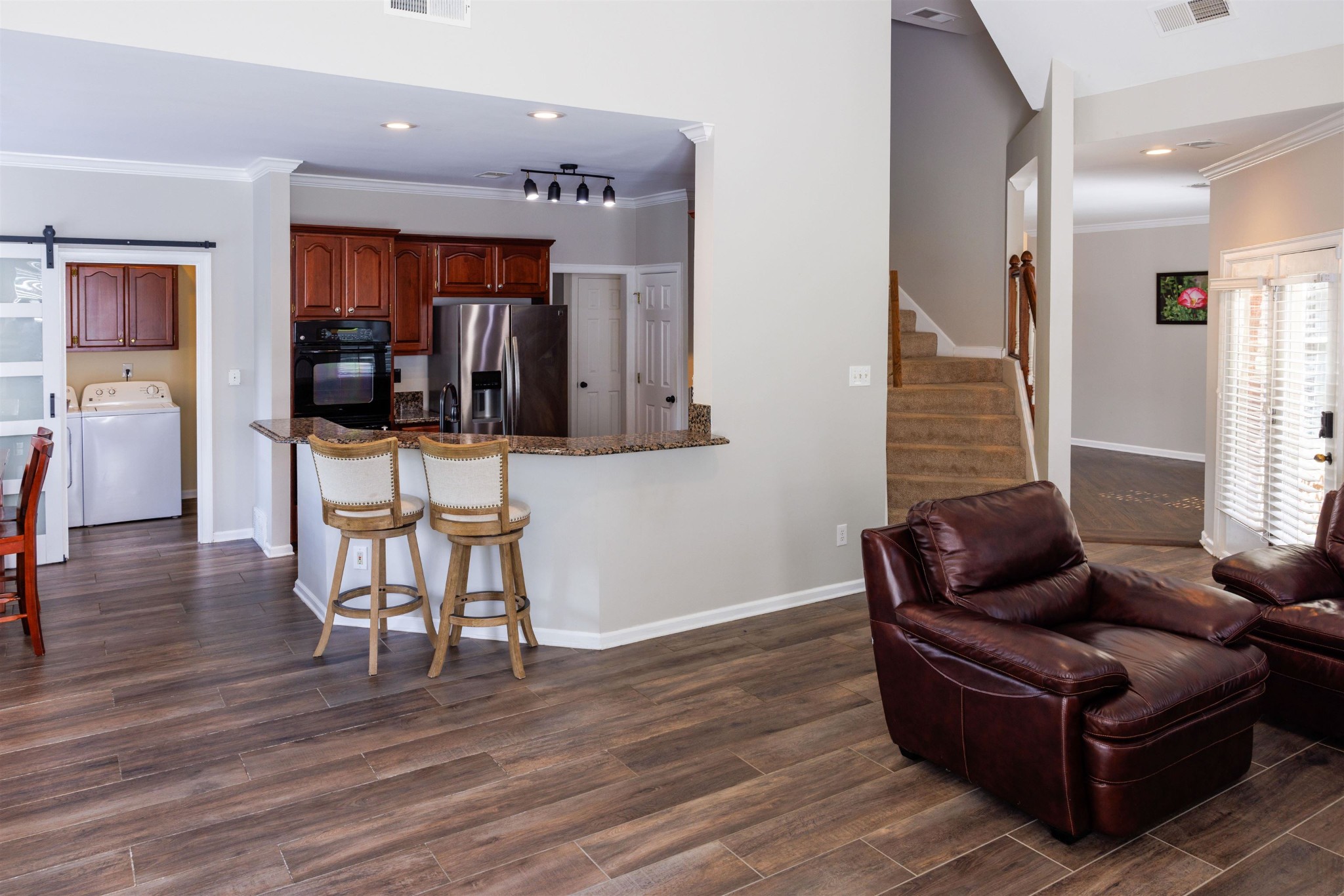 95 Morris Manor Drive Collierville, TN 38017 - Photo 13 of 35 a living room with furniture and wooden floor
