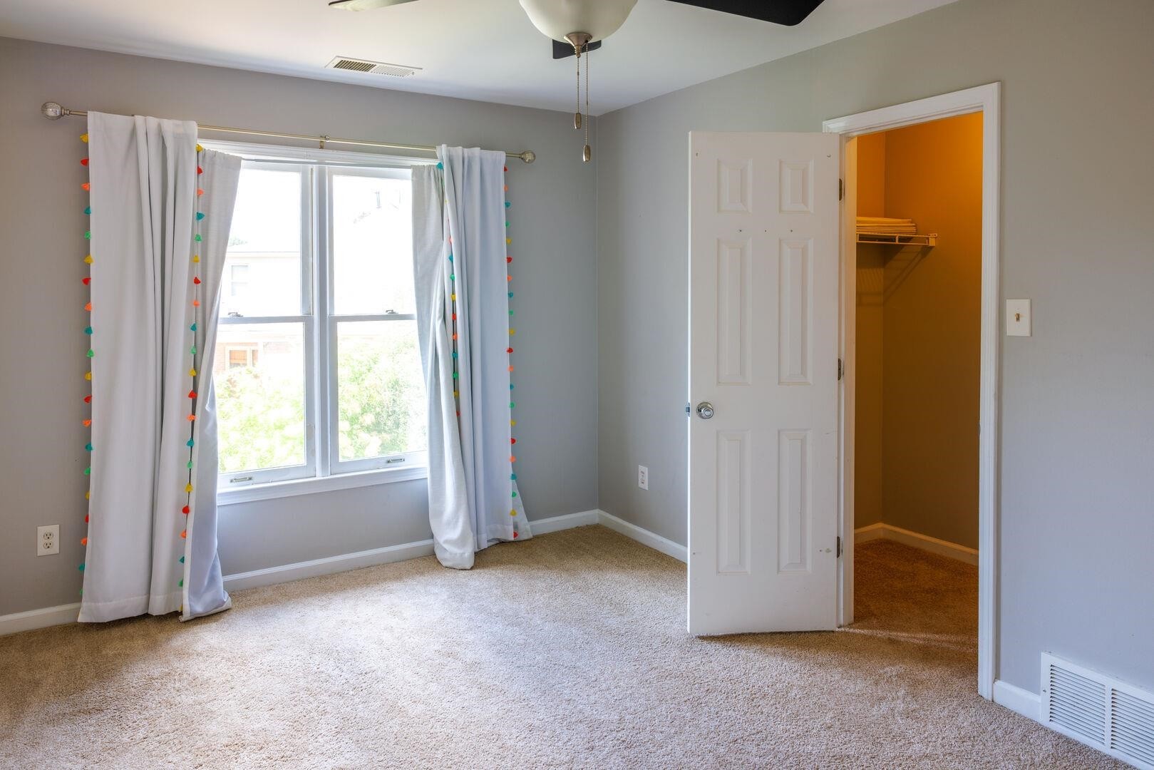 95 Morris Manor Drive Collierville, TN 38017 - Photo 19 of 35 an empty room with windows and closet