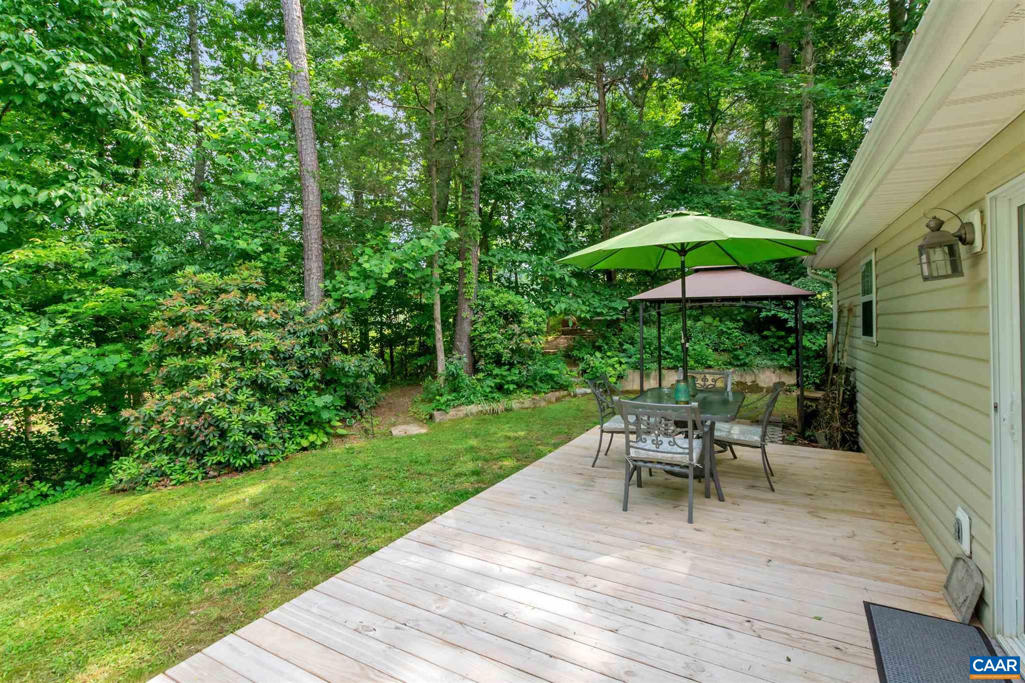 352 East Daffodil Road Ruckersville, VA 22968 - Photo 34 of 36 a view of backyard with seating space and garden