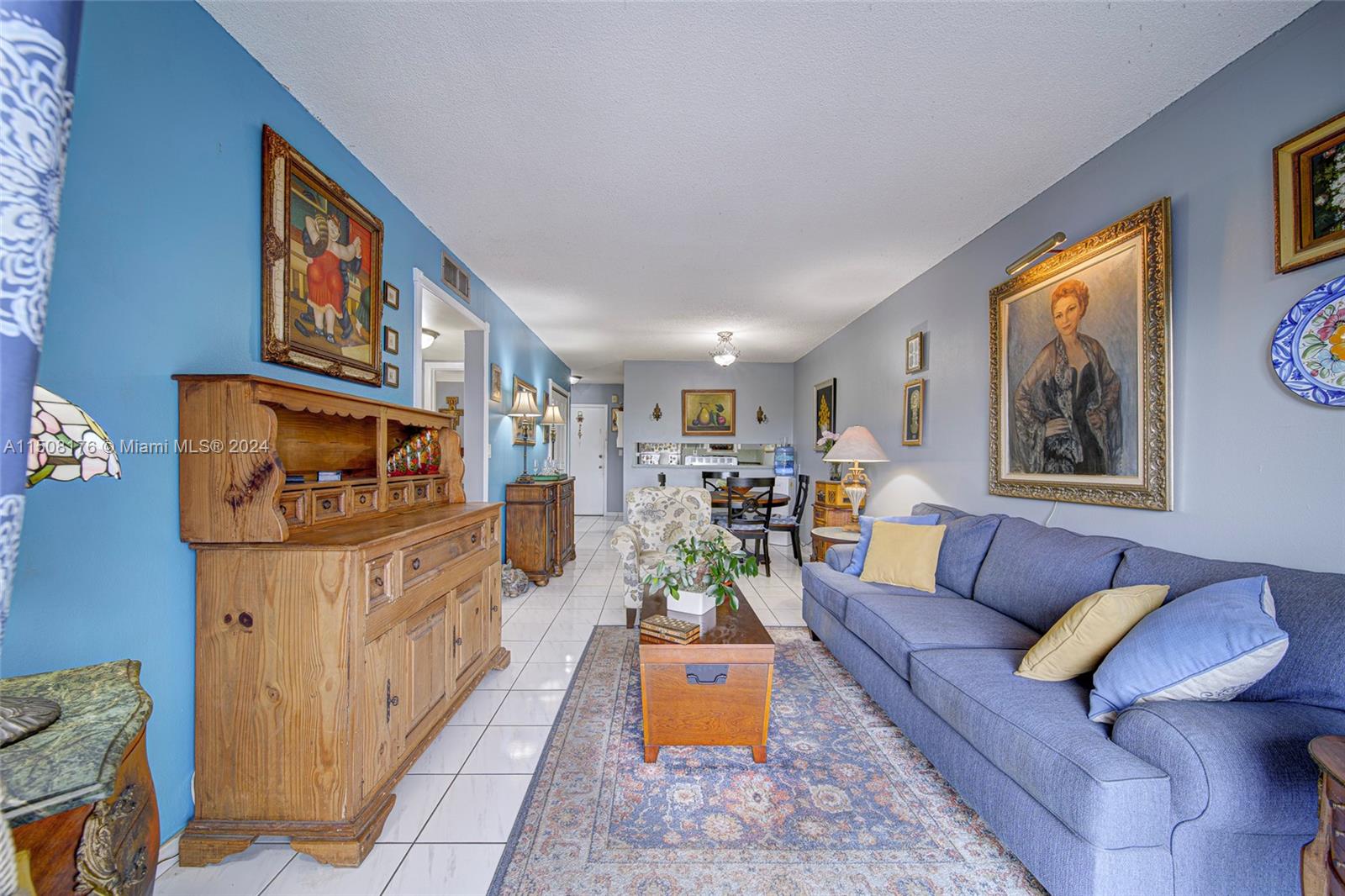 Coral Gate Miami, FL 33145 - Photo 21 of 35 a living room with furniture and a flat screen tv