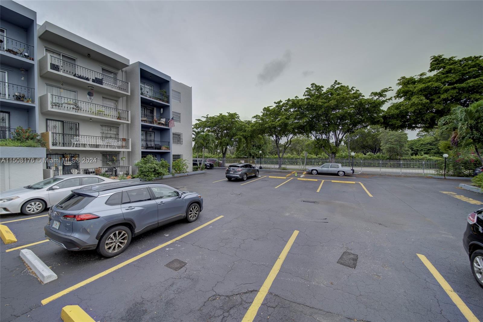 Coral Gate Miami, FL 33145 - Photo 4 of 35 a view of street with parked cars