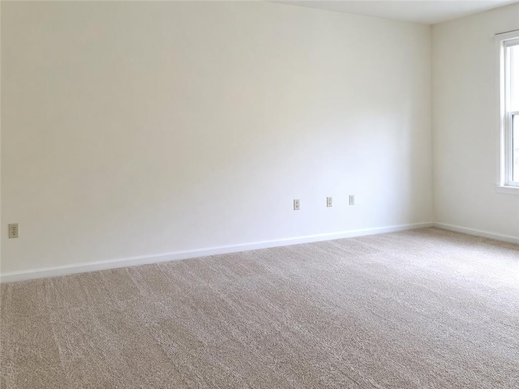 302 Ridgeview Drive Alburtis, PA 18011 - Photo 2 of 3 A well-lit, neutral-toned room offers a blank canvas for personalization.
