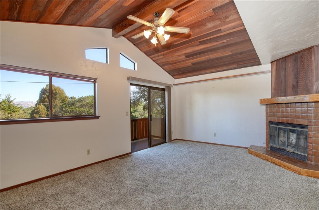 2550 Emerson Road Cambria, CA 93428 - Photo 15 of 49 a view of an empty room with a fireplace