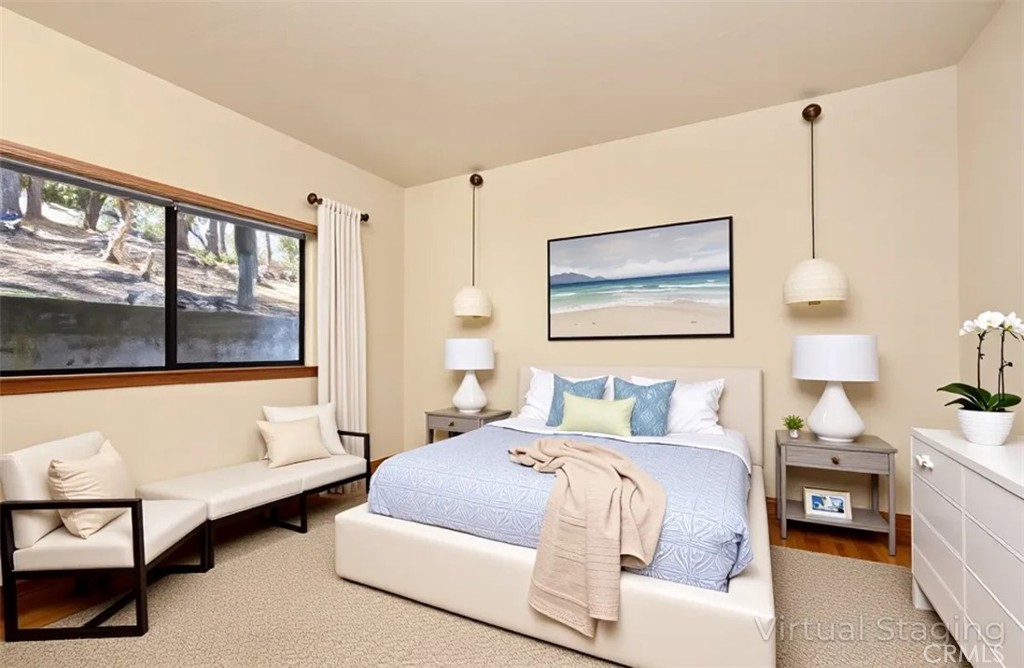 2550 Emerson Road Cambria, CA 93428 - Photo 23 of 49 a bedroom with bed and a large window