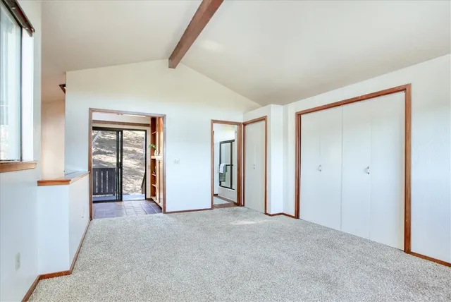 a bathroom with a sink a mirror and a shower