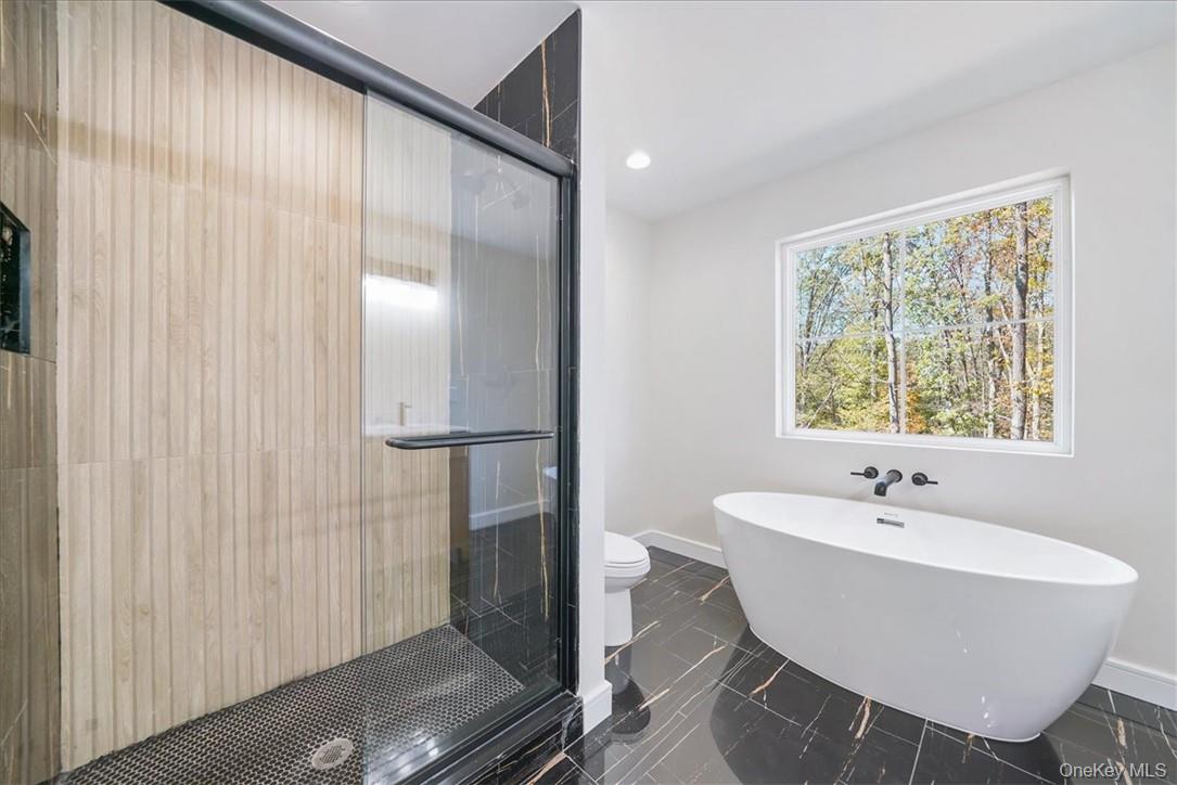 Lot 18-20 Silo Ridge Drive Wallkill, NY 12589 - Photo 23 of 37 a bathroom with a sink and a mirror