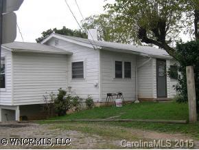 569 Mulberry Street Clyde, NC 28721 - Photo 1 of 3 a view of a house with a yard
