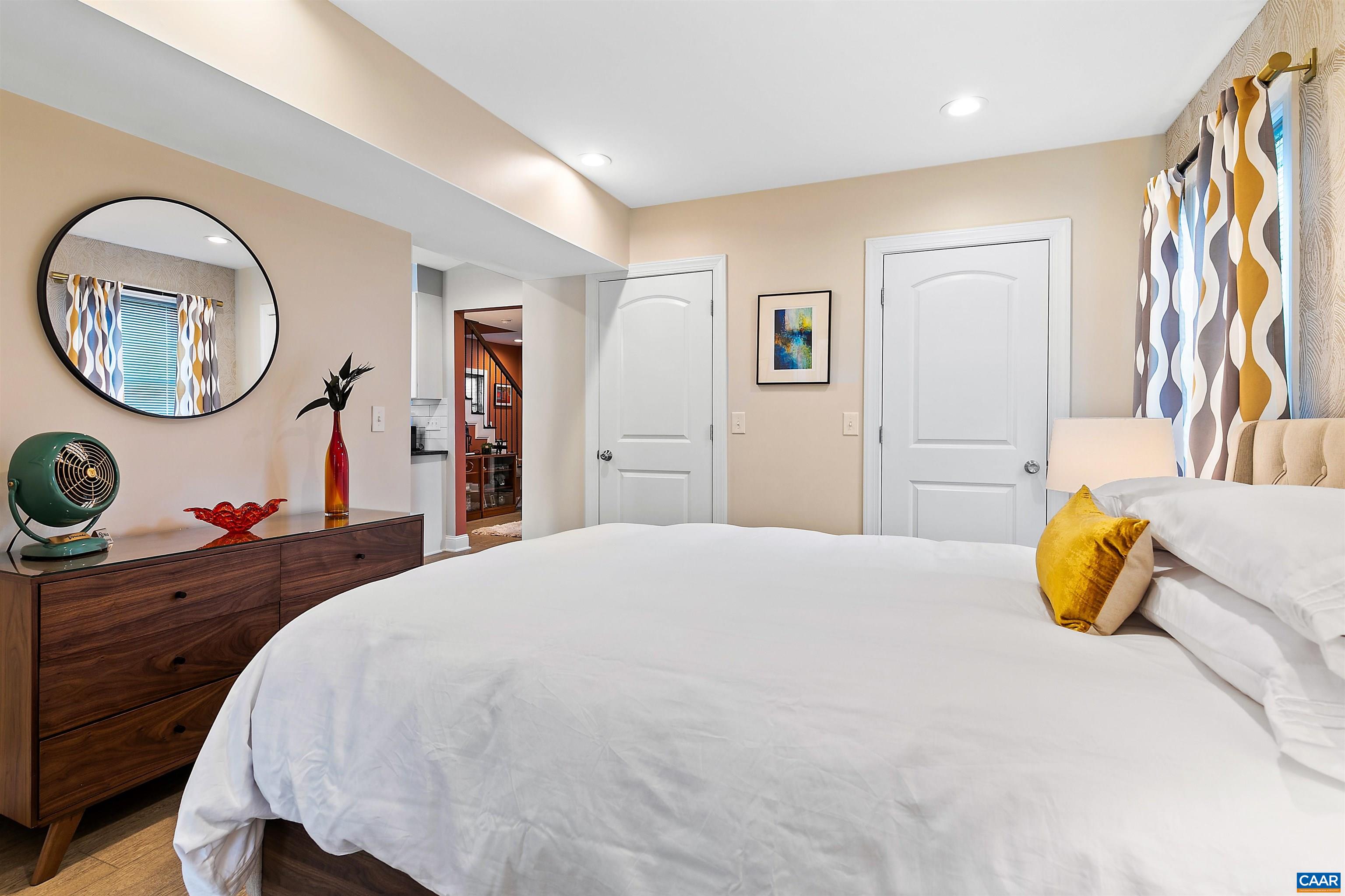 708 West Street Charlottesville, VA 22903 - Photo 12 of 34 a bedroom with a bed and a dresser