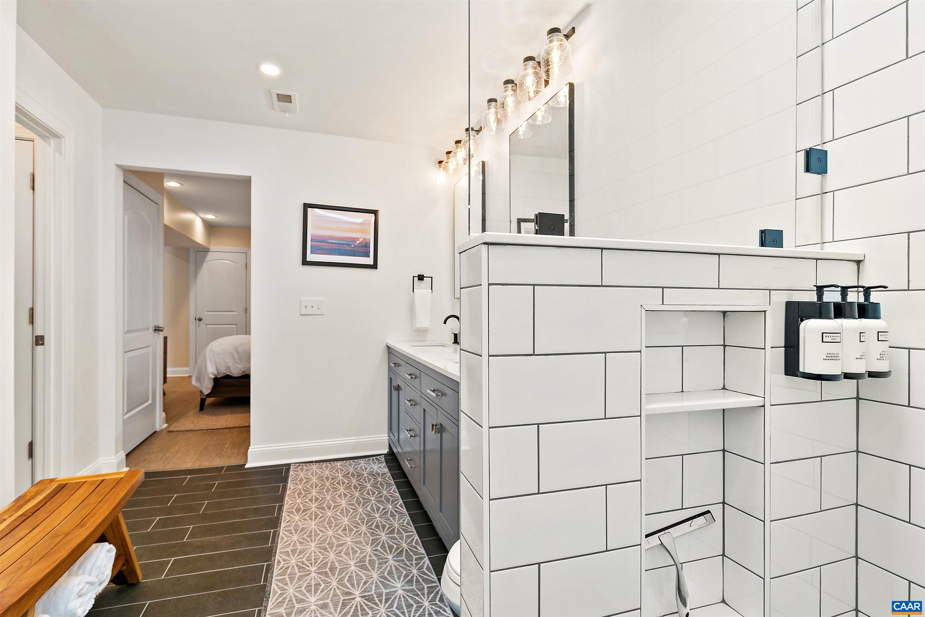 708 West Street Charlottesville, VA 22903 - Photo 15 of 34 a bedroom with furniture and a rug