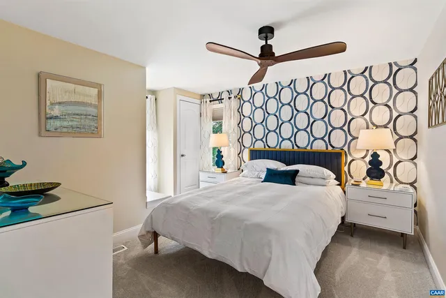 a bedroom with a bed and window