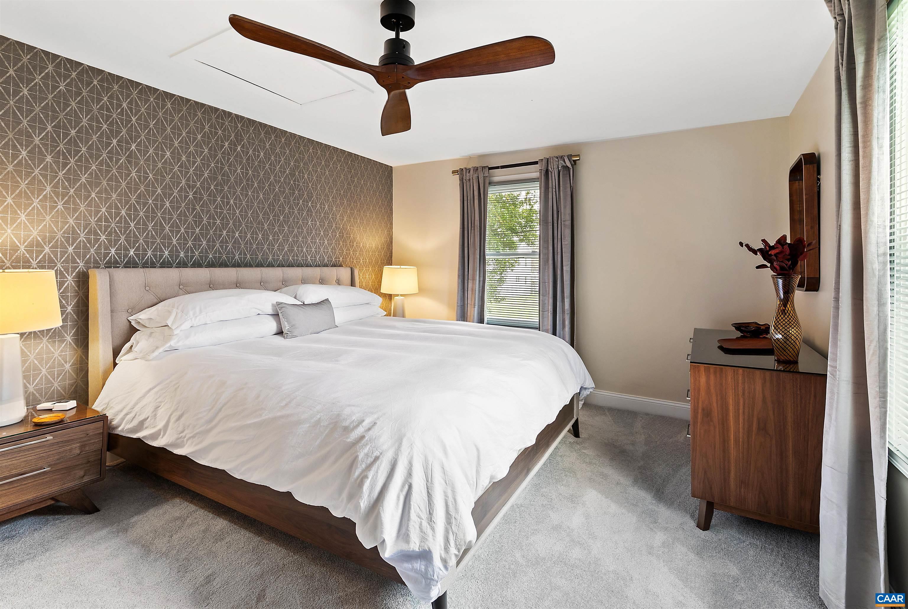 708 West Street Charlottesville, VA 22903 - Photo 26 of 34 a bedroom with a bed and a mirror