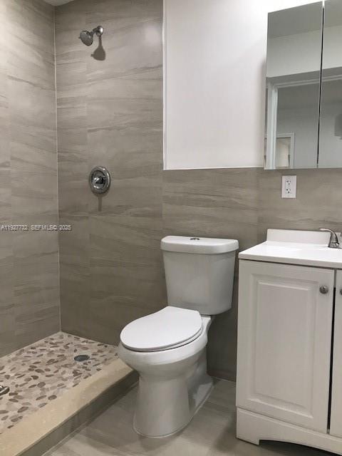 9420 Southwest 55th Street, Unit 2 Miami, FL 33165 - Photo 8 of 9 a bathroom with a toilet and a sink