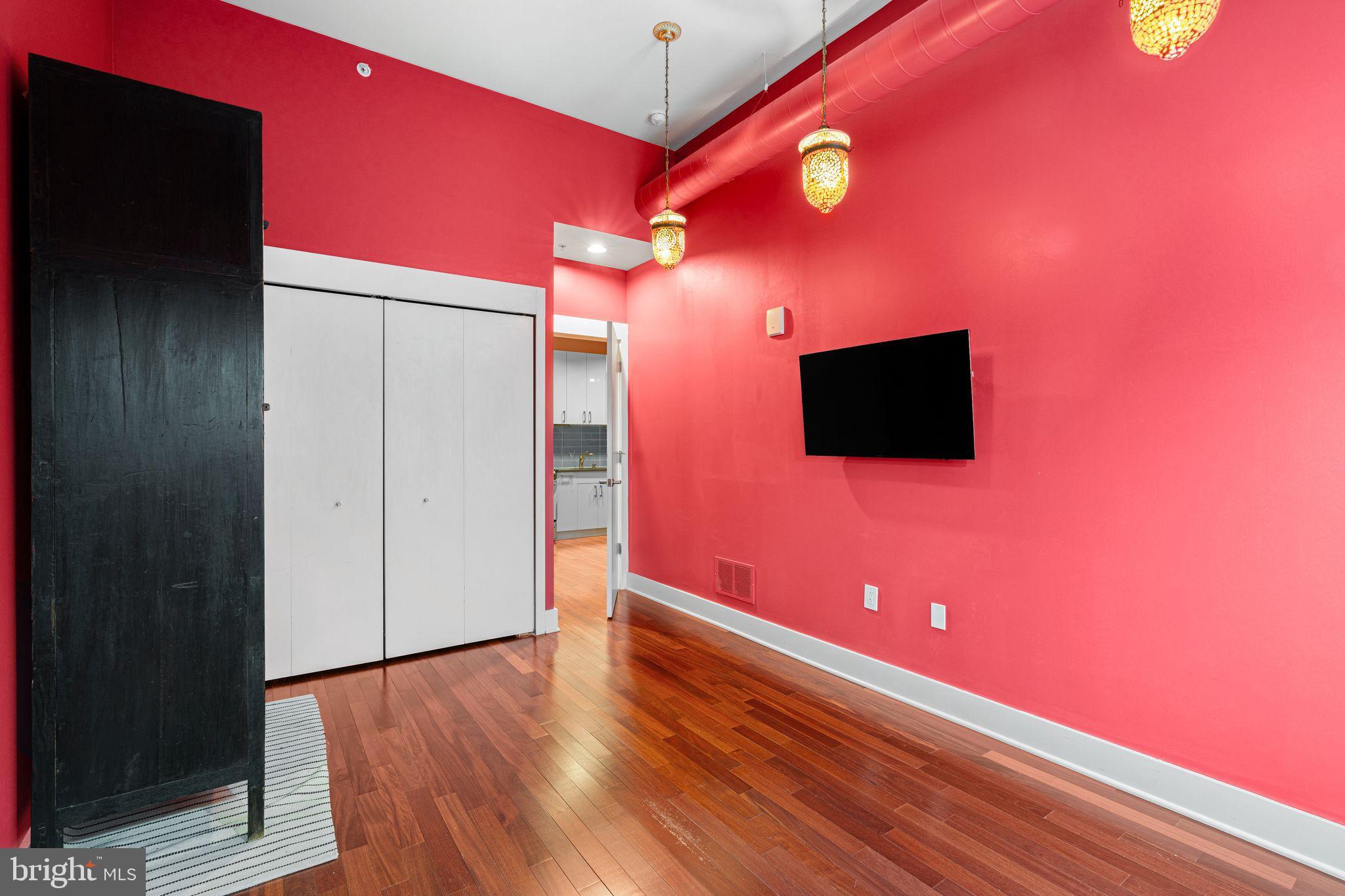 1101 Locust Street, Unit 4L Philadelphia, PA 19107 - Photo 14 of 25 a view of a livingroom with wooden floor