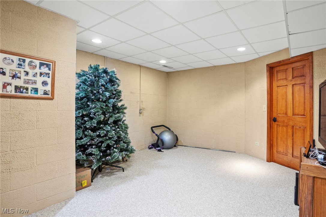 1232 Ashwood Road Akron, OH 44312 - Photo 40 of 50 Workout area featuring a paneled ceiling, recessed lighting, and carpet floors