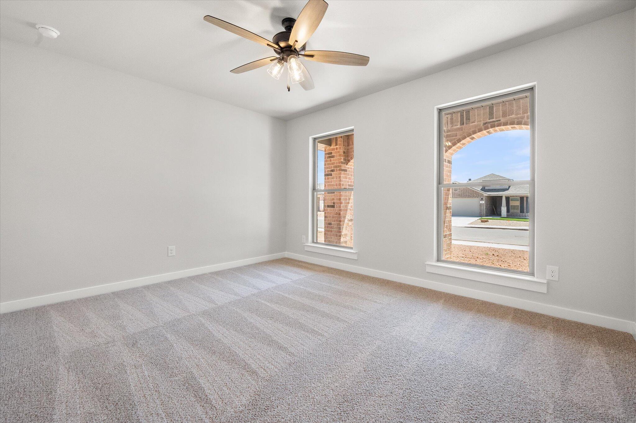 7436 29th Street Lubbock, TX 79407 - Photo 18 of 22 a view of an empty room with a window