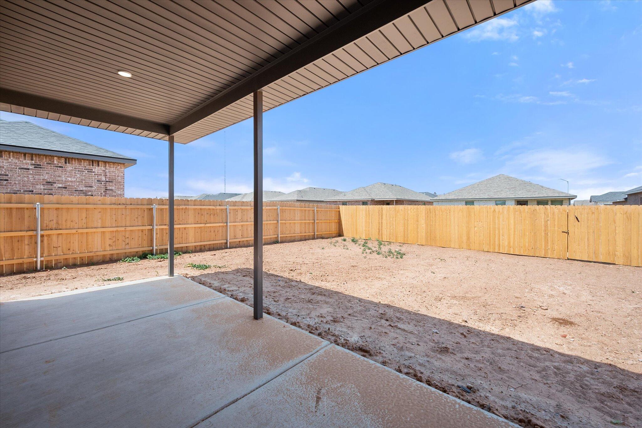 7436 29th Street Lubbock, TX 79407 - Photo 22 of 22 a view of a swimming pool with a patio