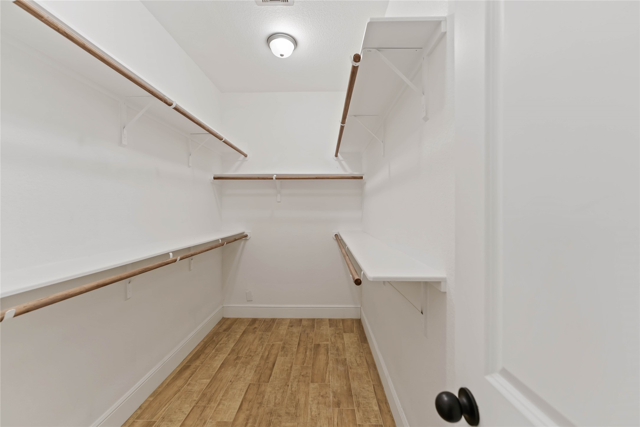 4651 Mallow Street, Unit AB Houston, TX 77051 - Photo 17 of 20 a view of entryway with wooden floor