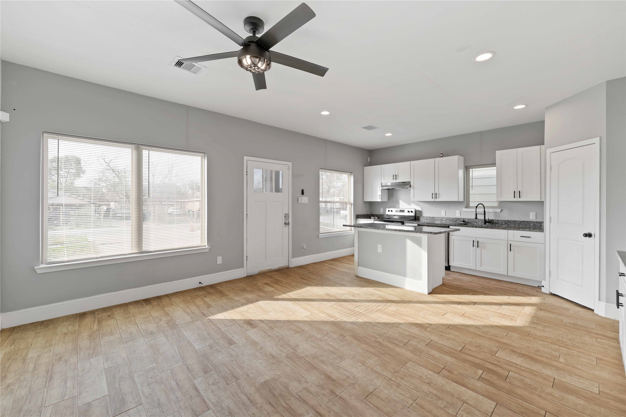 4651 Mallow Street, Unit AB Houston, TX 77051 - Photo 4 of 20 a view of a kitchen with electric appliances