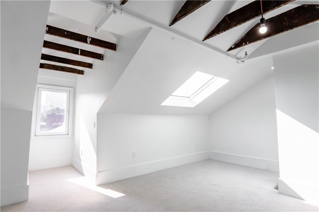 4402 Butler Street Pittsburgh, PA 15201 - Photo 17 of 28 an empty room with windows