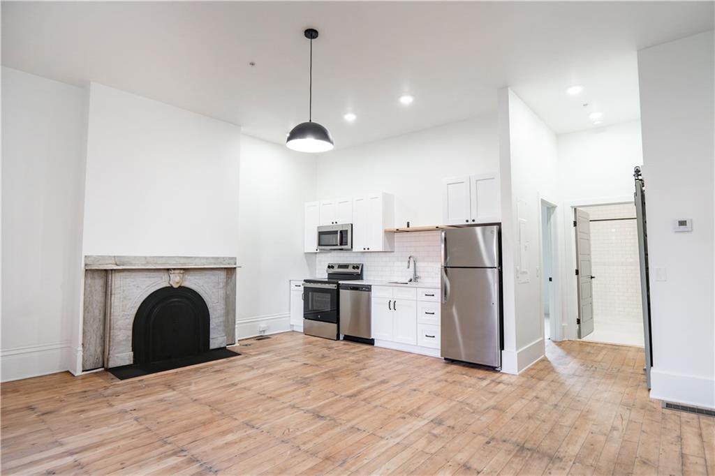 4402 Butler Street Pittsburgh, PA 15201 - Photo 5 of 28 a view of kitchen and refrigerator