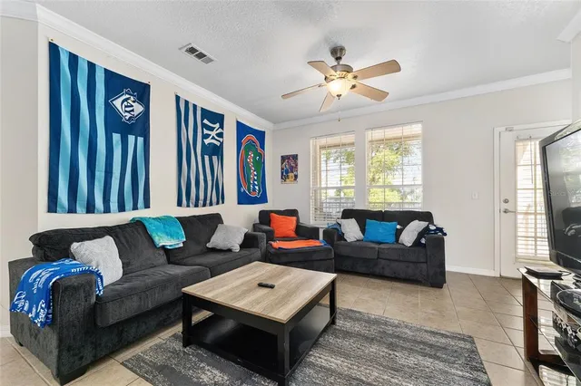 a living room with furniture and a window