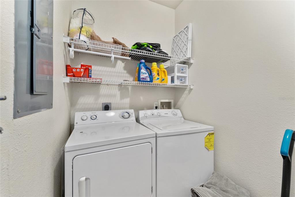 1142 Southwest 9th Road, Unit 103 Gainesville, FL 32601 - Photo 36 of 40 a utility room with dryer and washer