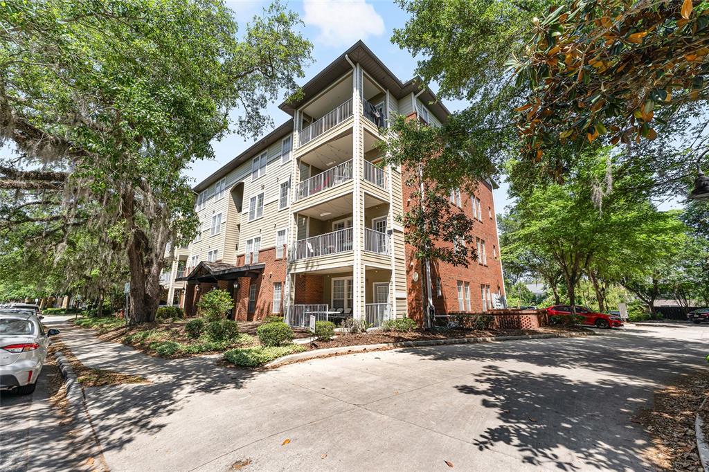 1142 Southwest 9th Road, Unit 103 Gainesville, FL 32601 - Photo 40 of 40 a view of a building with a street