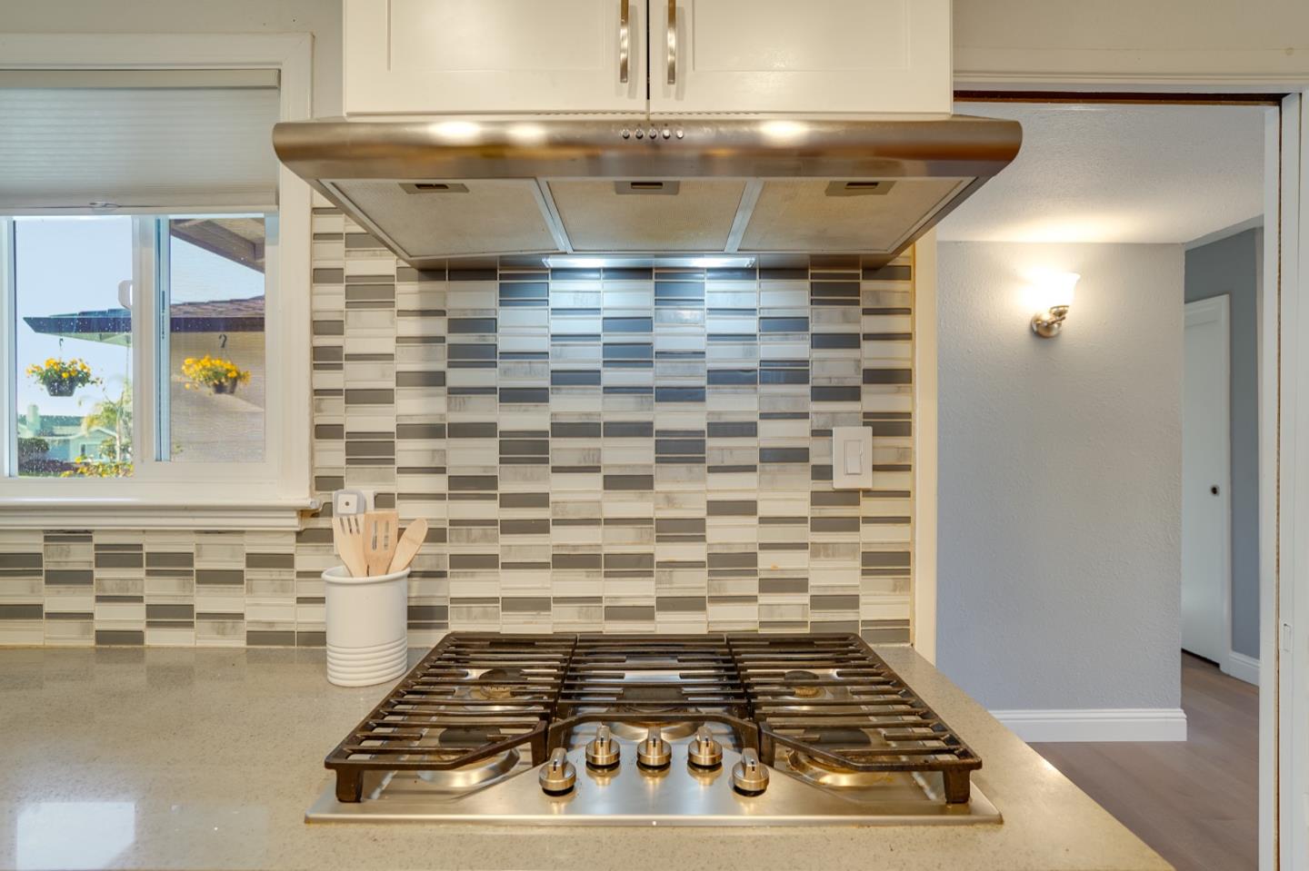 3143 Kermath Drive San Jose, CA 95132 - Photo 13 of 62 a stove top oven sitting inside of a kitchen