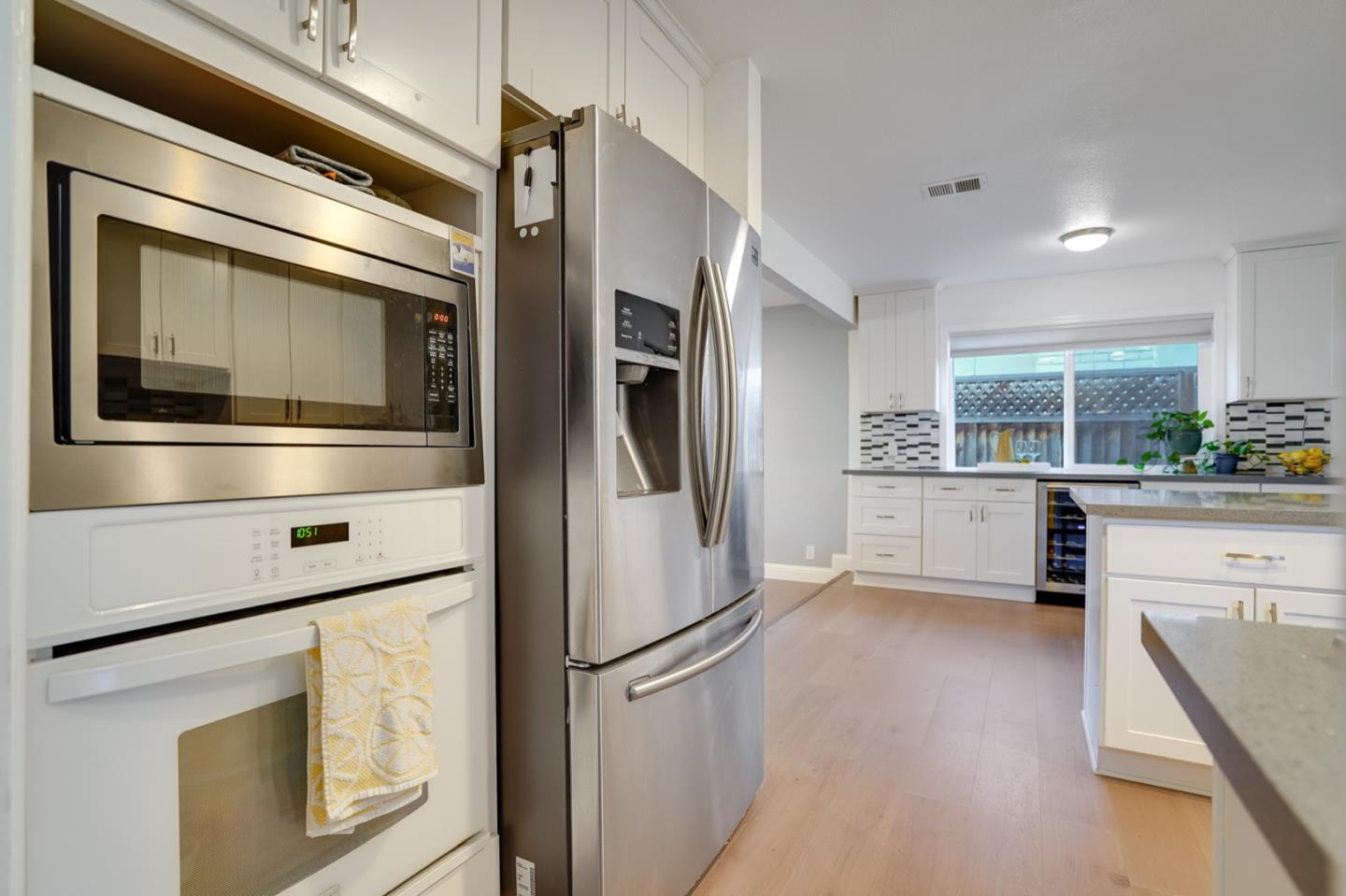 3143 Kermath Drive San Jose, CA 95132 - Photo 14 of 62 a kitchen with stainless steel appliances a refrigerator sink and cabinets