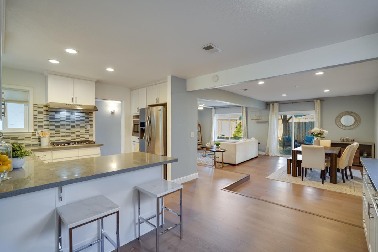 3143 Kermath Drive San Jose, CA 95132 - Photo 16 of 62 a view of a dining room with furniture window and wooden floor