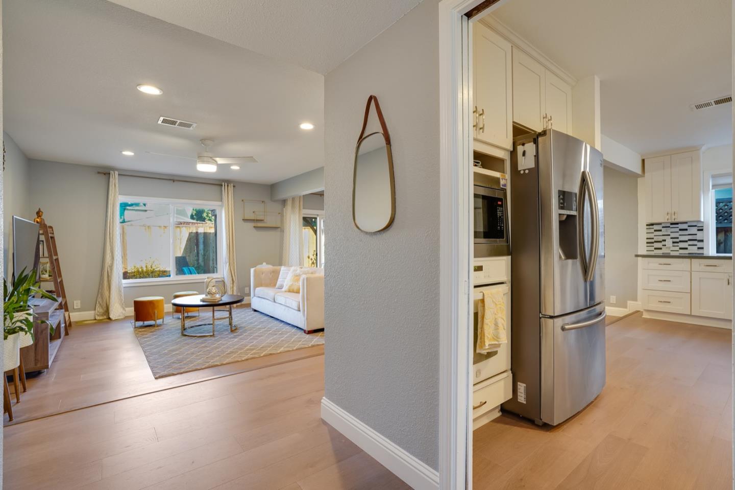 3143 Kermath Drive San Jose, CA 95132 - Photo 17 of 62 a living room with furniture windows and a view of kitchen