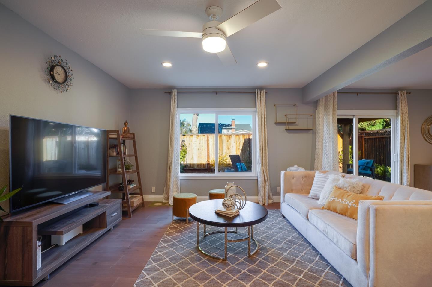 3143 Kermath Drive San Jose, CA 95132 - Photo 19 of 62 a living room with furniture and a flat screen tv