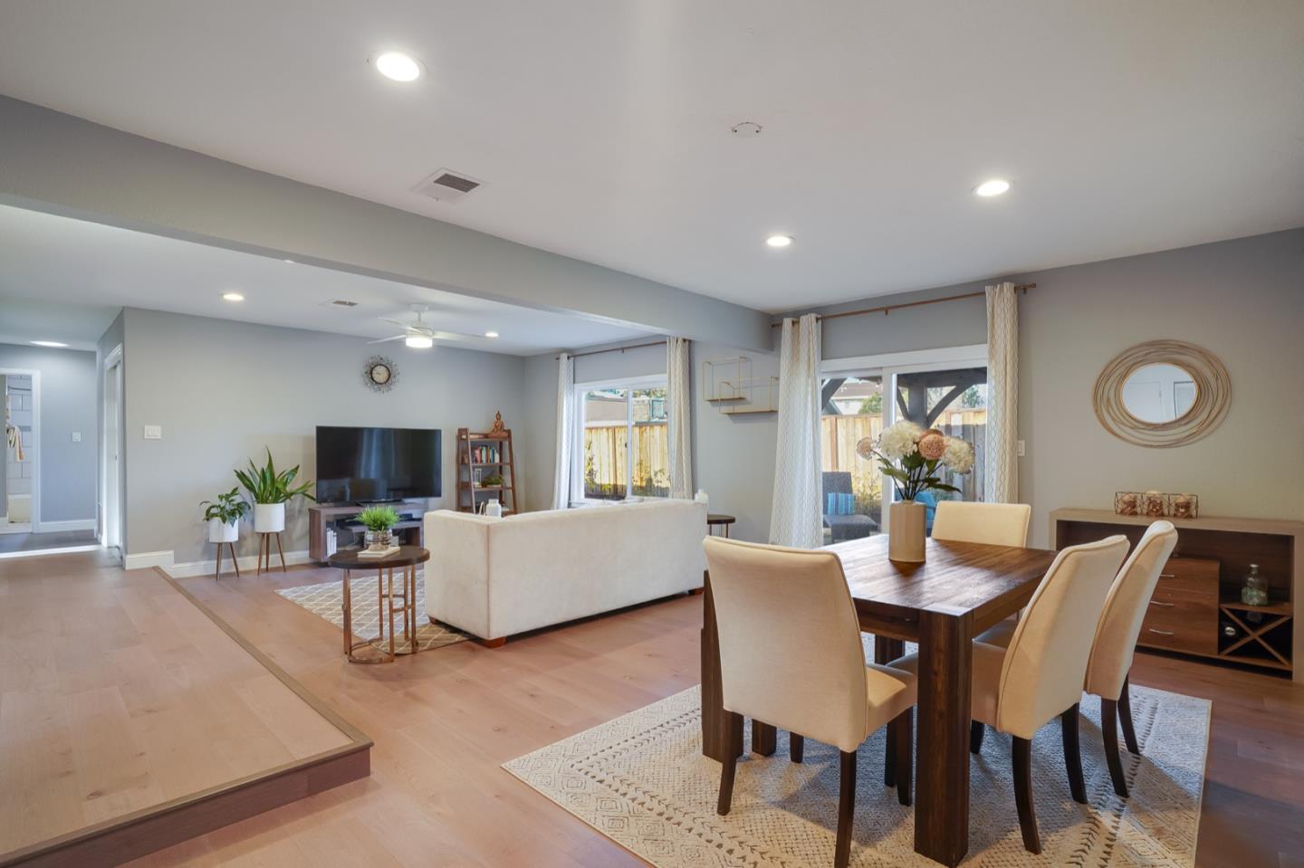 3143 Kermath Drive San Jose, CA 95132 - Photo 23 of 62 a view of a dining room with furniture and wooden floor