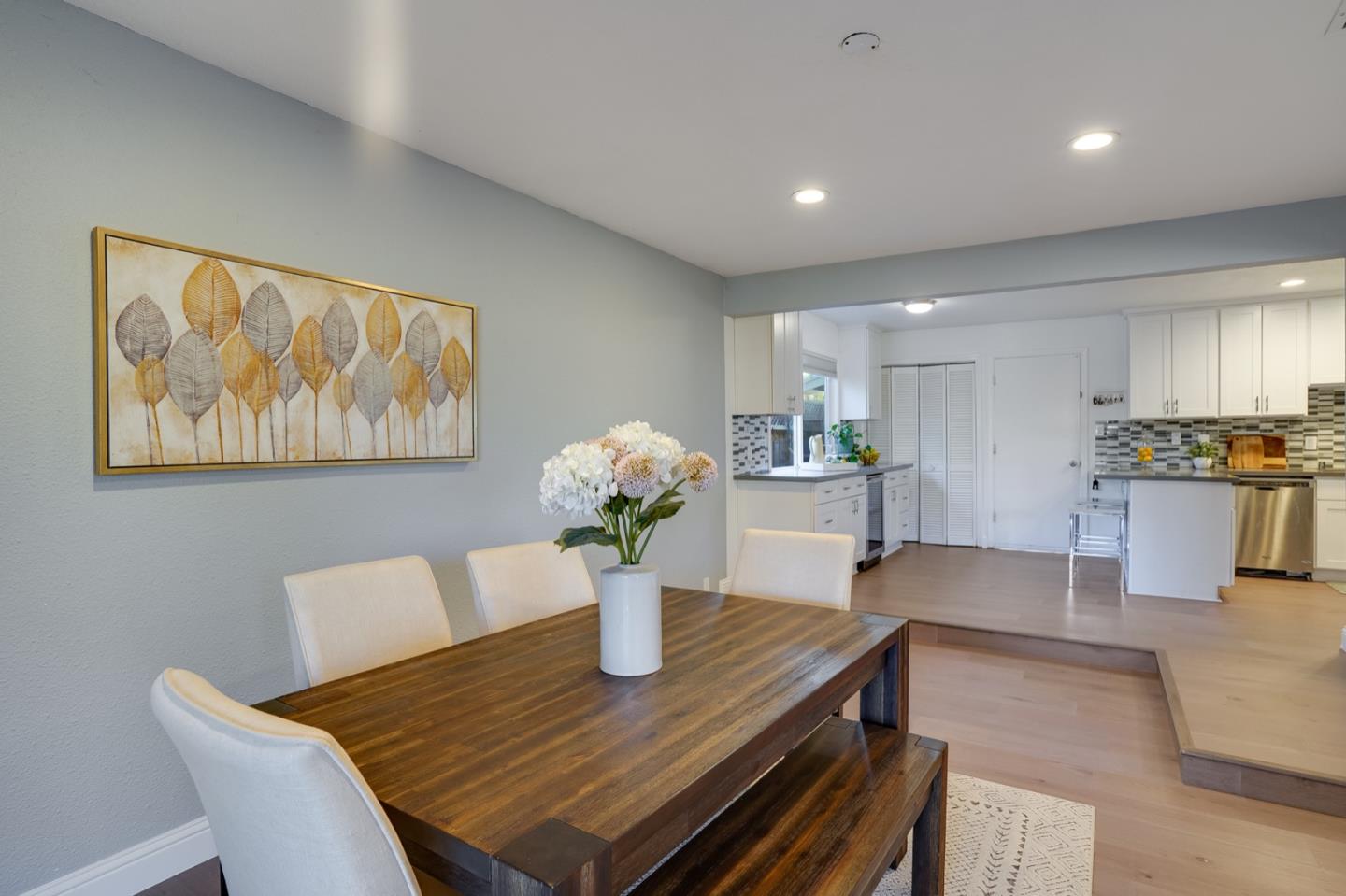 3143 Kermath Drive San Jose, CA 95132 - Photo 25 of 62 a view of a dining room with furniture and wooden floor