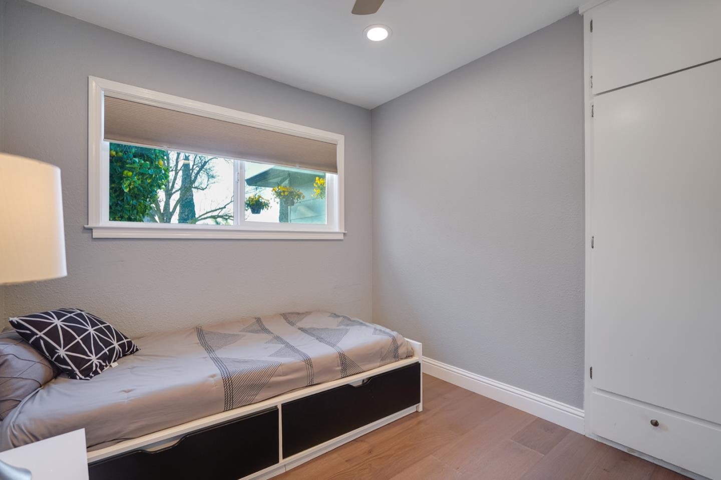 3143 Kermath Drive San Jose, CA 95132 - Photo 37 of 62 a bedroom with a bed and a window