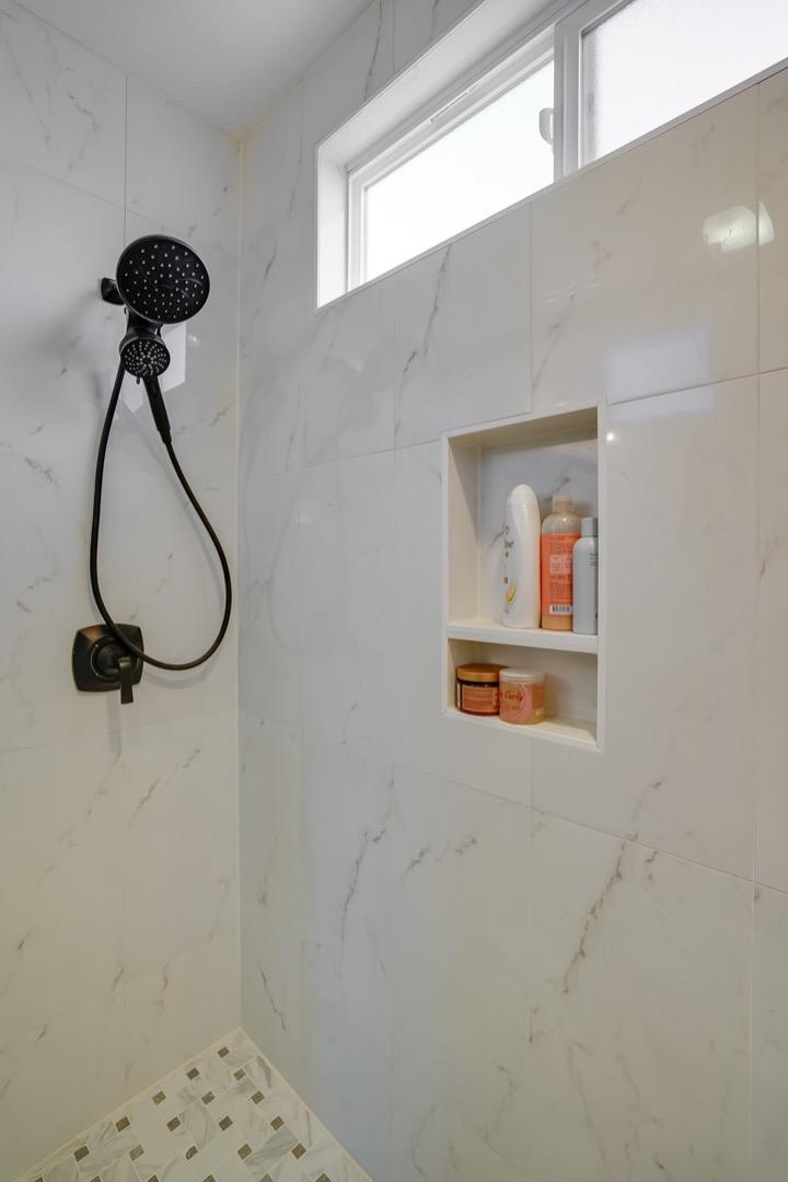 3143 Kermath Drive San Jose, CA 95132 - Photo 41 of 62 a bathroom with a shower